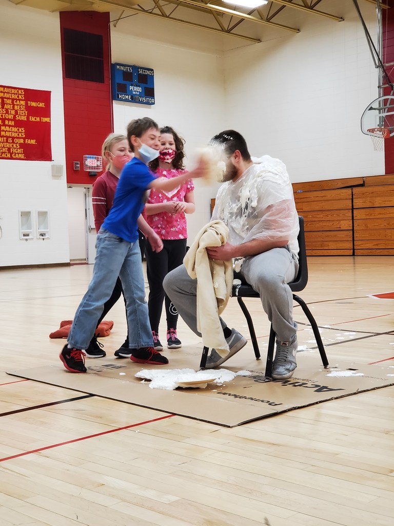 student pies teacher in the face